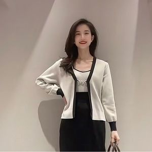SKIDEL Elegant Women's Black and White Jacket set up